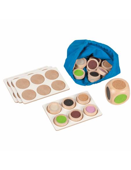 Jeu sensoriel Montessori avec textures variées pour explorer le toucher