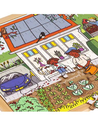 Puzzle éducatif de 100 pièces représentant une maison durable, idéal pour sensibiliser les enfants à l’écologie et au climat