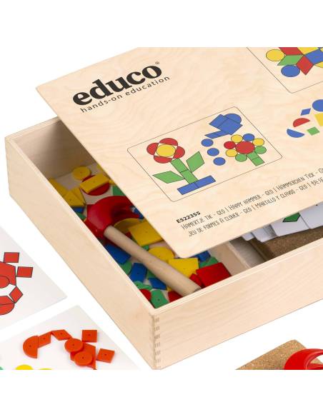 Jeu éducatif classique avec marteau, clous et formes géométriques pour développer motricité et créativité