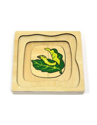Puzzle Montessori en bois illustrant le cycle de vie du papillon, un outil éducatif et ludique pour découvrir la zoologie